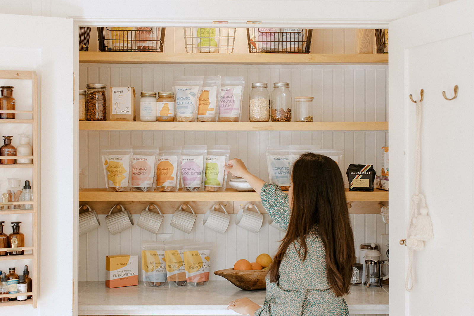 woman stocking pantry